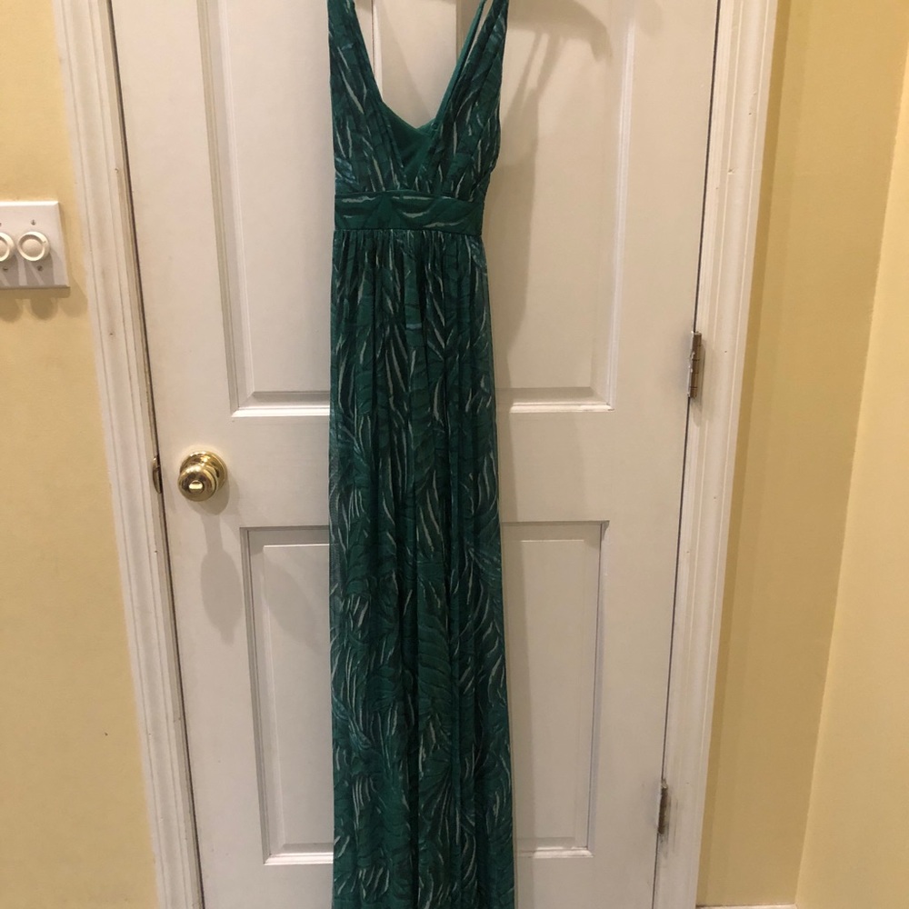 Long shear green with mini dress underneath